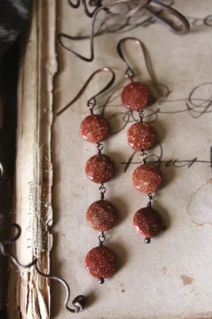 Hearthfire. Linear Goldstone Drop Earrings.