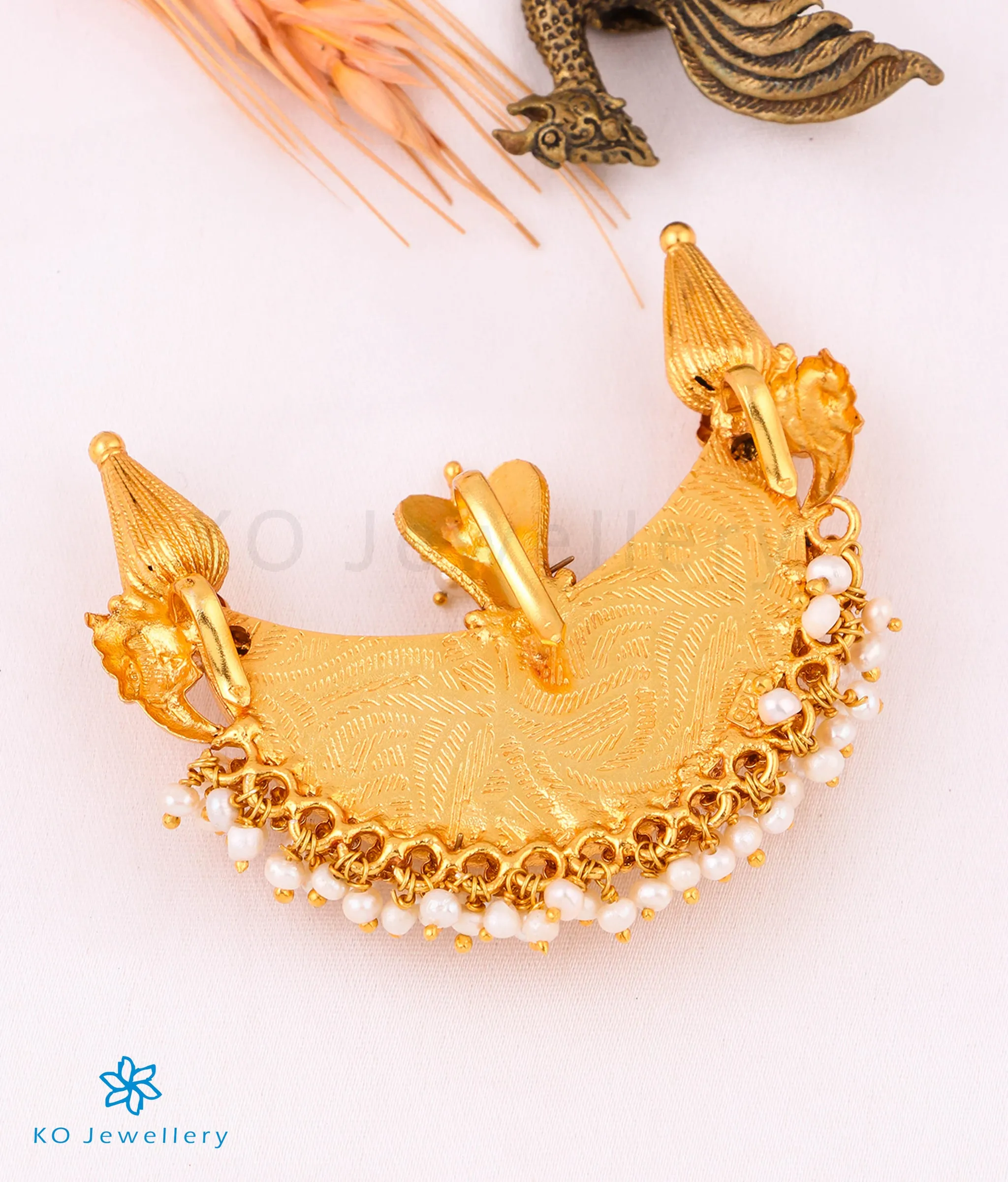 The Pushpita Kokkethathi Silver Pendant