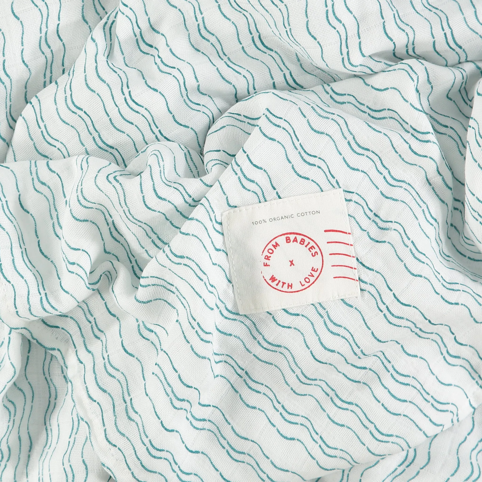Waves of Joy organic muslin baby shawl